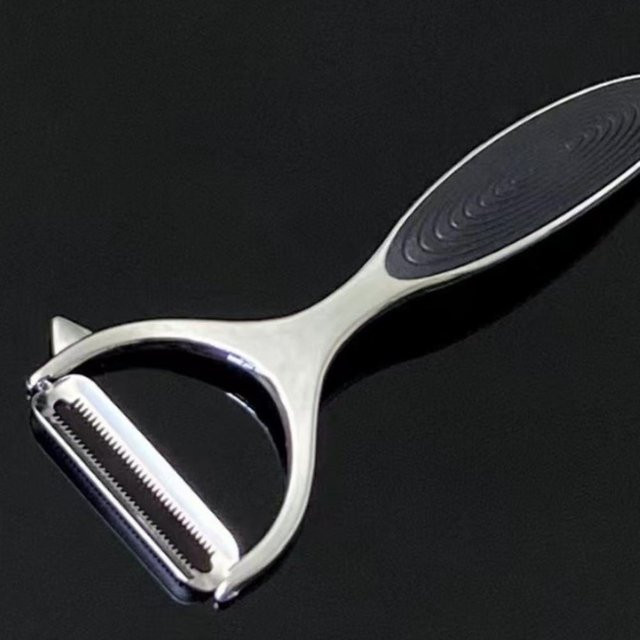 Yuyongzhi Gemüseschäler aus Edelstahl in Schwarz und Silber als multifunktionaler Kartoffelschäler und Karottenreibe - Bild 1