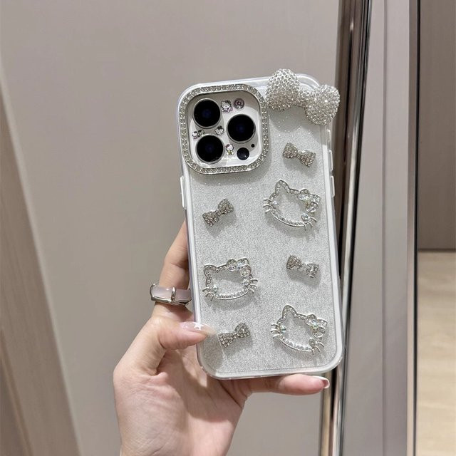 Sanrio Hello Kitty Handyhülle mit 3D Cartoon Design und Glitzer-Schleife für iPhone 11 bis iPhone 17 Pro Max in Bonbonfarben - Bild 1