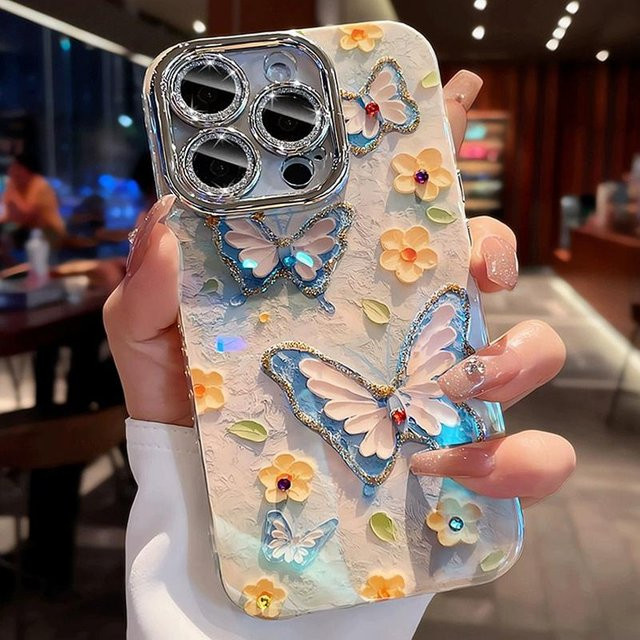 Yiran Handyhülle mit Schmetterling und Blumen Design in Multicolour für iPhone 11 bis iPhone 16 Pro Max Plus mit Laser Glitzer und Diamant-Effekt, stoßfeste Bumper Hülle - Bild 1
