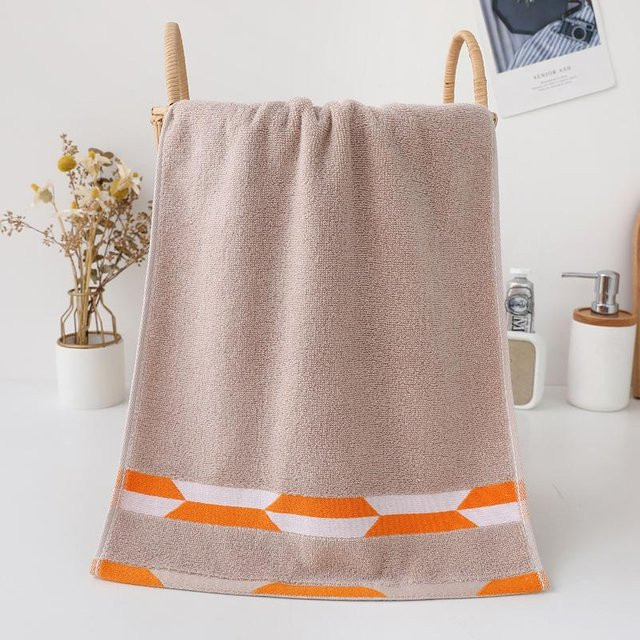 Jacquard Baumwollhandtuch mit Stickerei von Yiran Furniture, B/H: 33 x 73 cm, Blau oder Orange - Bild 1