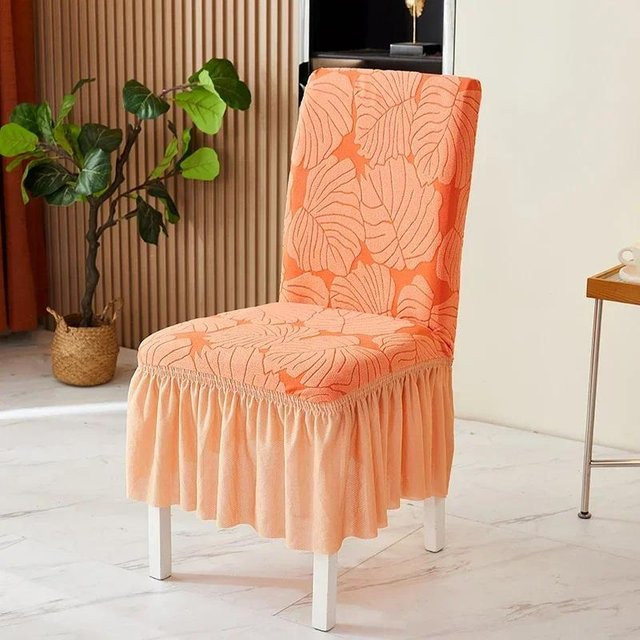 Stretch Esszimmerstuhlbezug mit Blätter-Jacquard-Muster und Schößchen in Orange - Bild 1