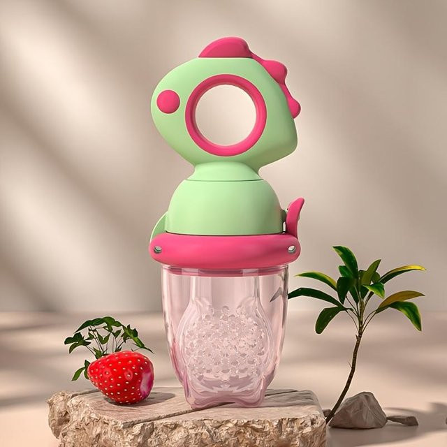Dinosaurier Silikon Baby Fruchternährer in Grün mit drehbarem Druck-Mechanismus - Bild 1