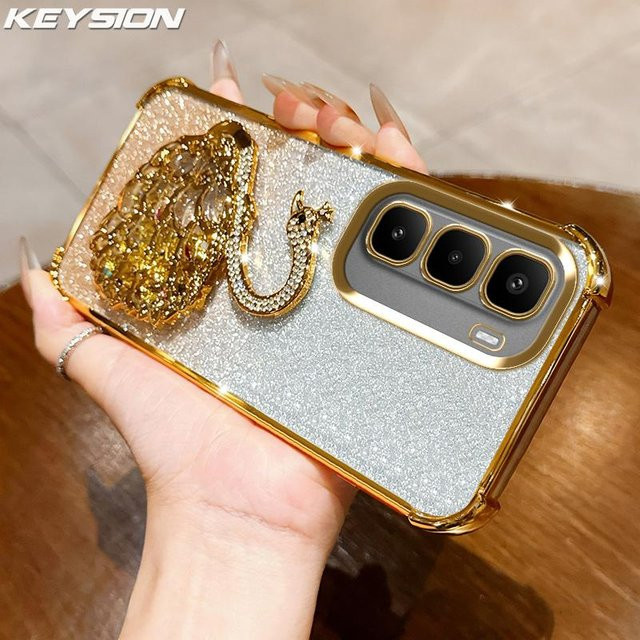 KEYSION Handyhülle mit Stoßfestem Schutz und Schwan-Ständer für Infinix Hot 60 Pro+, Hot 60 5G und Hot 60i 4G, Transparent mit Silber Glitzer und Juwelenbesatz - Bild 1