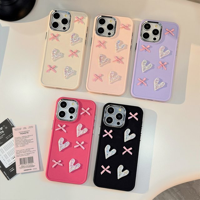 MUQGEW 3D Bogen Perlen Handyhülle mit Liebe-Überzug für iPhone 11 bis iPhone 16 Pro Max in Candy Farbe, stoßfeste Schutzhülle - Bild 1