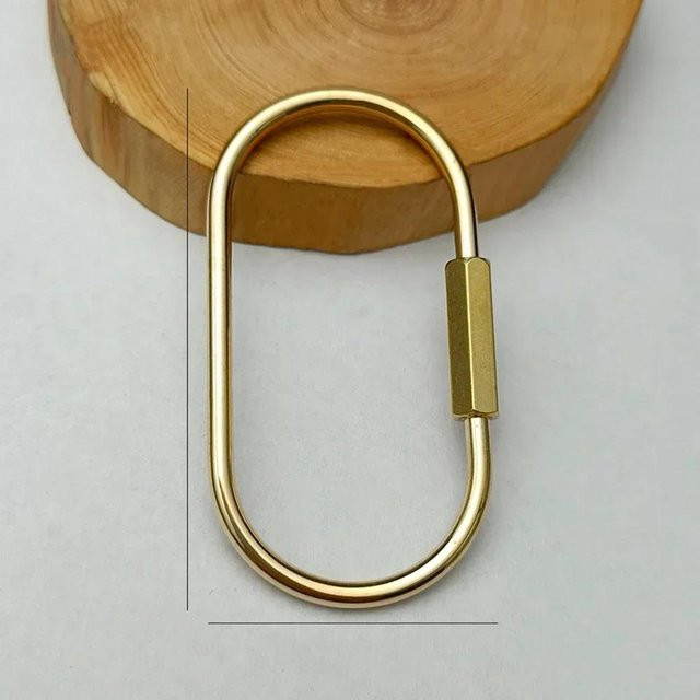 XYNN Schlüsselanhänger Messing, Goldfarben, Unisex - Bild 1