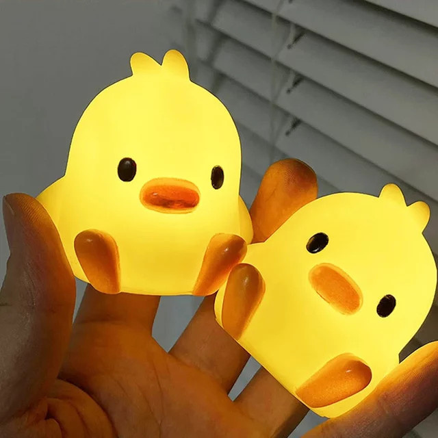 XIWANGFIRE Enten-Nachtlampe aus Silikon in Gelb als dekoratives Tier-Nachtlicht für das Schlafzimmer oder den Nachttisch - Bild 1