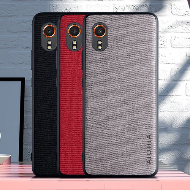 Luxuriöse Textil-Lederhülle für Samsung Galaxy Xcover 7 5G in Orange mit weicher TPU-Hartschale und präziser Kameraaussparung - Bild 1