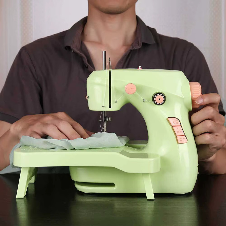 Mini Nähmaschine für den Haushalt in Grün mit Nachtlicht, Fußpedal und Knopfleiste - Bild 3