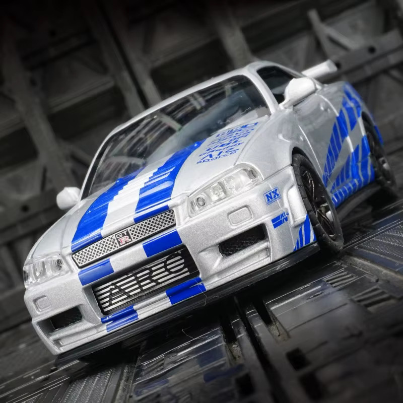 Maisto GTR-R34-Automodell, Maßstab 1:32, beleuchtete Räder und Motorgäusche - Bild 2