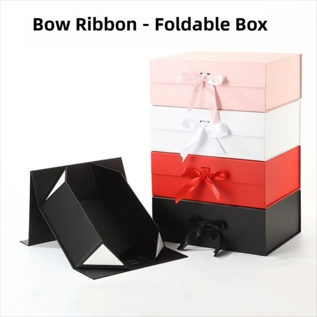 Faltbare Geschenkbox mit Schleife aus Papier in Pink für Partys und Valentinstag - Bild 1