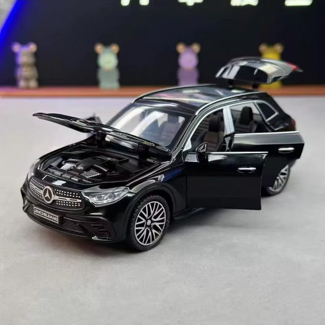 WELLY Mercedes-Benz GLC-400E, Spielzeugauto, 1:32, mit Licht und Sound - Bild 1