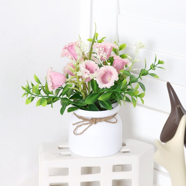 Künstliche Orchidee in Keramiktopf als moderne Tischdekoration in Weiß und Pink - Bild 1