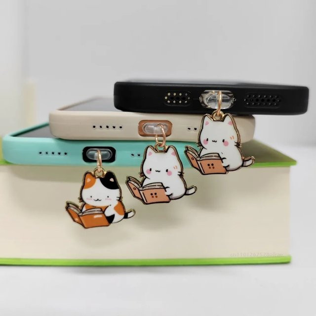 Dekorative staubdichte Steckerabdeckung in Katzenform für USB-C Ladeanschlüsse als Handyschmuck - Bild 1
