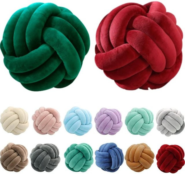 Dekoratives rundes Kissen aus Lammplüsch in Knotendesign für Kinder und Weihnachten, Farben: Rot, Grün und Cremeweiß - Bild 1