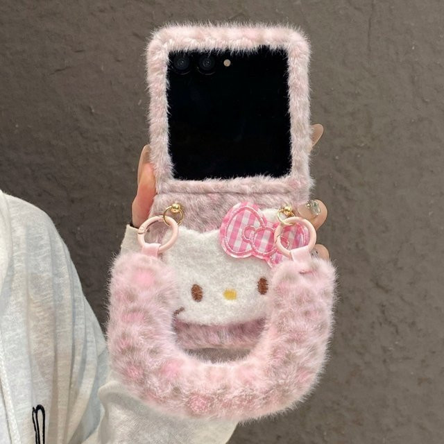 Sanrio Hello Kitty Handyhülle mit Leopardenmuster und flauschigem Handgelenkband für Samsung Galaxy Z Flip und Z Fold Modelle in Pink/Multicolour - Bild 1
