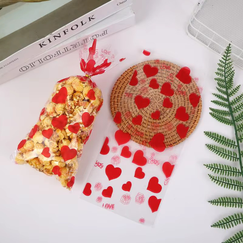 SAFENH Transparente OPP-Geschenktüten mit rotem Herz-LOVE-Aufdruck und goldenen Bändern für den Valentinstag - Bild 3