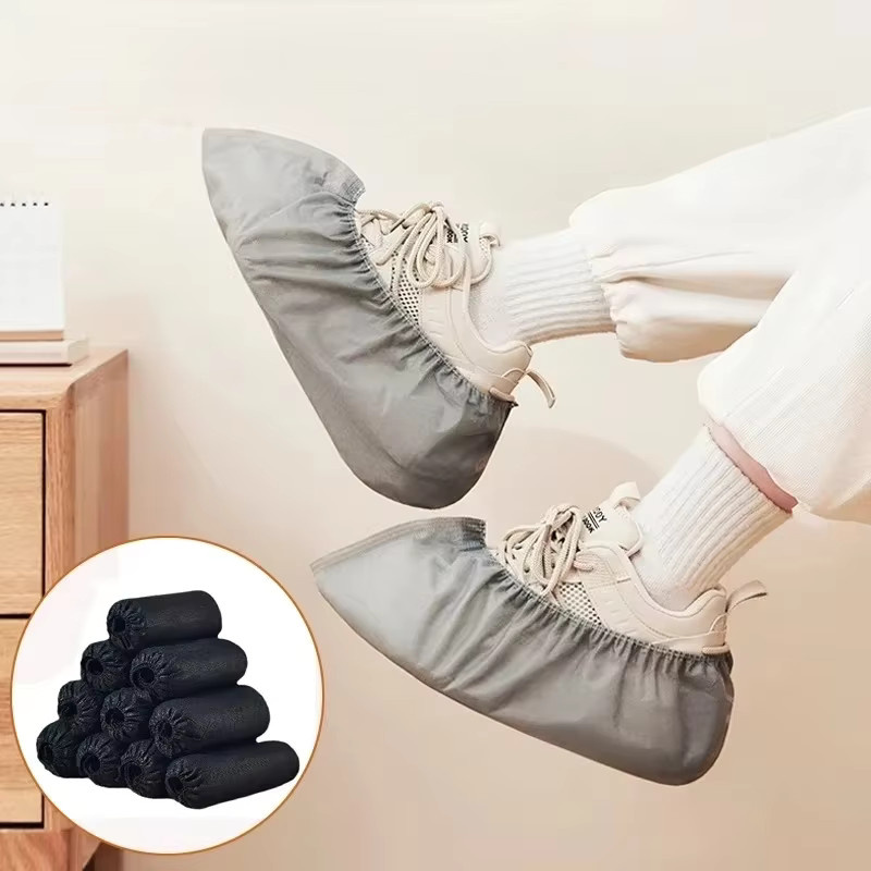 100 Stück Einweg-Stiefelüberzüge in Grau, rutschfest und dehnbar als Bodenschutz für Schuhe - Bild 2