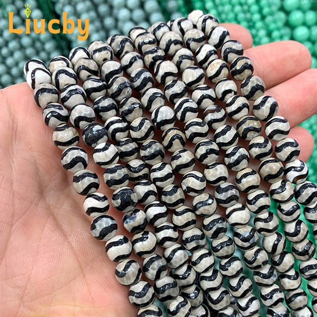 Liucby Perlen, Naturstein, 6/8mm, Facettiert, Strang - Bild 1