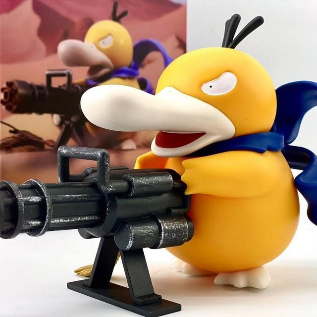 Bandai Pokémon Psyduck mit Gatling-Gewehr, Actionfigur, 9cm - Bild 1