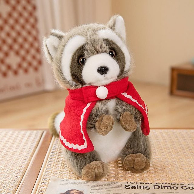 Kidsly Waschbär mit Glocken Mantel, Plüsch Spielzeug, 17cm, ab 14 Jahren - Bild 1