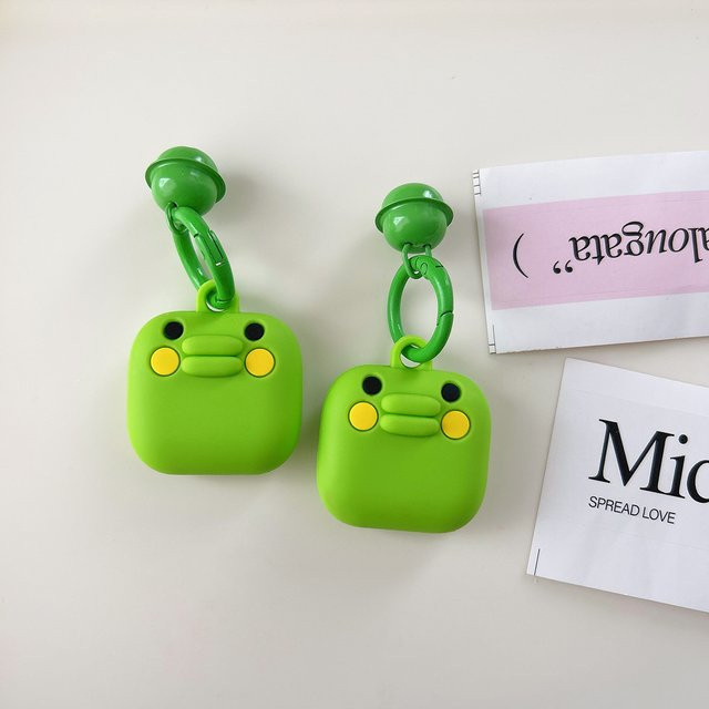 Tamagotchi Big Mouth Jar Apple AirTag Schutzhülle mit Schlüsselanhänger in Grün - Bild 1