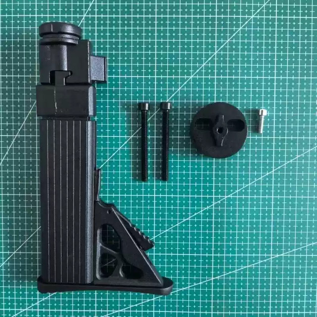 Metall-Nagelschießer mit Teleskopnagler, klappbarem Schaft und Schulterstütze in Schwarz als Komplettset - Bild 1