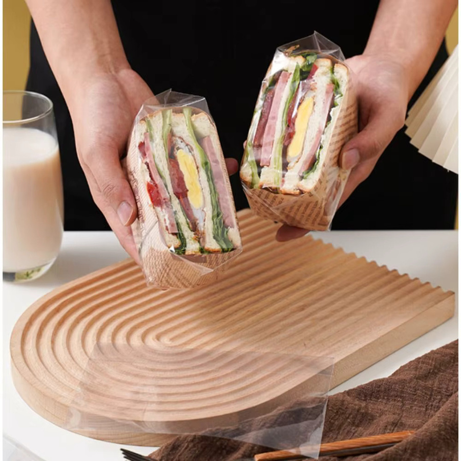 100 Stück transparente Sandwich-Verpackungstaschen aus Kunststoff mit Selbstklebe-Abdichtung für Lebensmittel und Hamburger - Bild 2