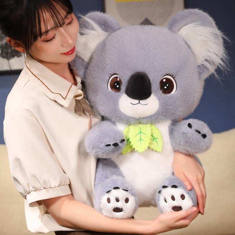 Grauer Koala Plüschtier mit Blättern - Bild 2