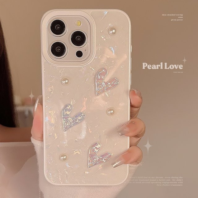 IQPEA Silikon Handyhülle mit 3D Laser-Herz und Perlenmuster für iPhone 15 Plus, 14, 13, 12, 11 Pro Max in Weiß - Bild 1