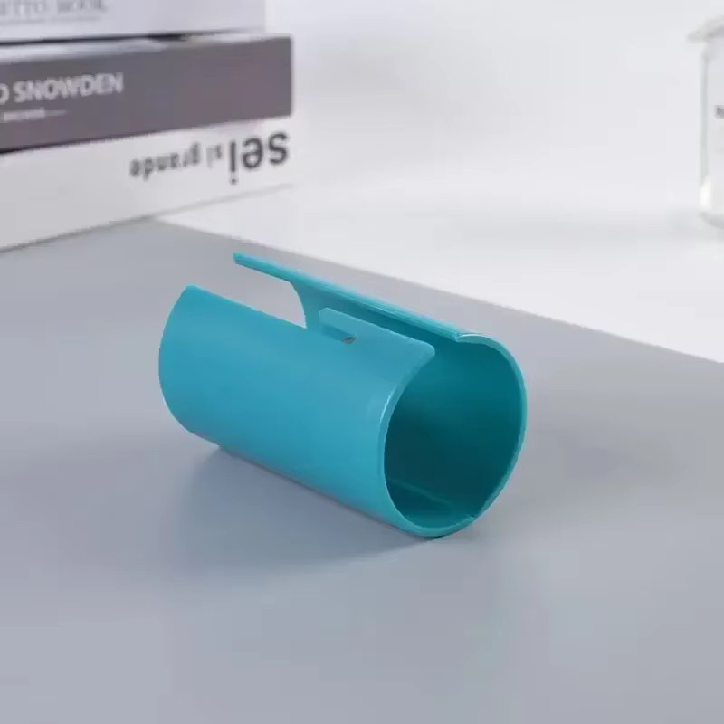 Tragbarer Mini-Zylinder-Papierschneider für Verpackungspapier aus Kunststoff in Schwarz und Türkis - Bild 3