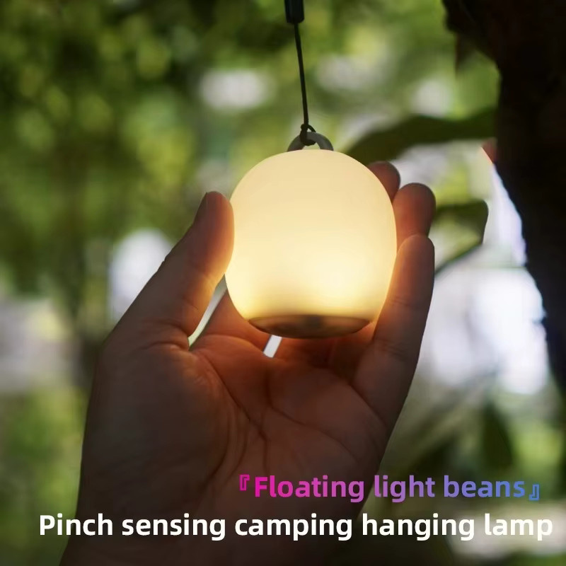 Eiförmiges Silikon-Campinglicht in Weiß mit warmweißem Licht und Touch-Bedienung via USB - Bild 2