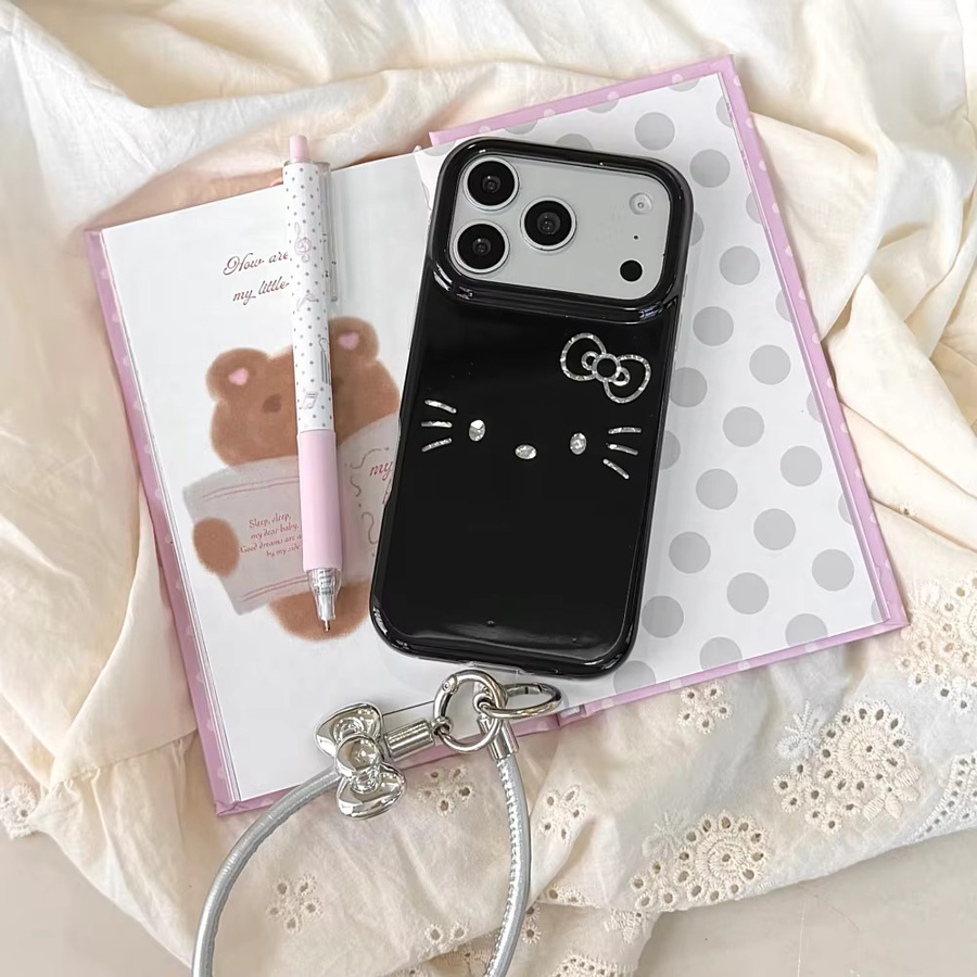 Sanrio Hello Kitty Handyhülle mit Trageriemen für iPhone 17 16 15 Pro Max, schwarz-weiß, glänzende Hartschale - Bild 2