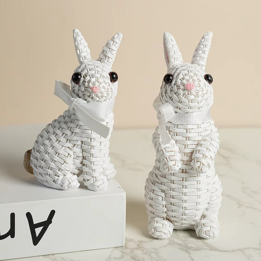 Osterhase mit Schleife als weiße Garten- und Heimdekoration aus Harz - Bild 1
