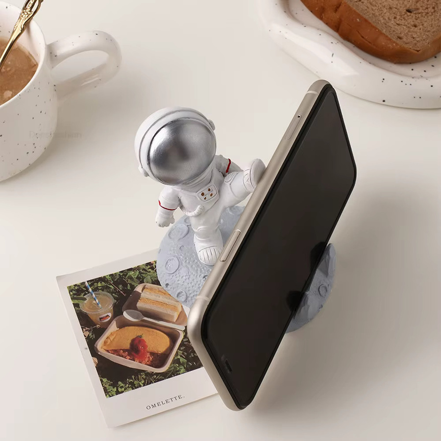 AKABEILA Nordic Astronaut Handyhalter aus Kunststoff für den Schreibtisch in Gold oder Weiß - Bild 1