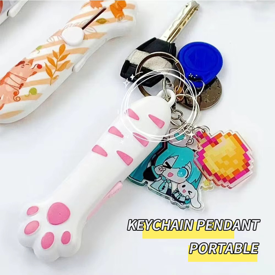 Einziehbarer Katzenkrallen Schlüsselanhänger als Mini-Paketöffner und Universalmesser in Pink - Bild 2
