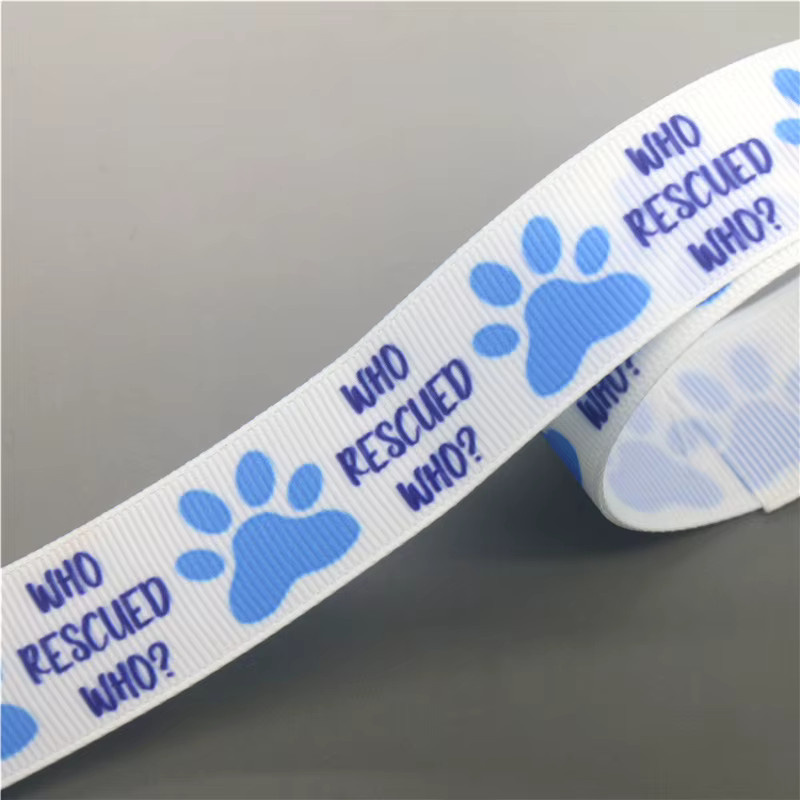 DHK Ripsband mit Hund und Katze Pfoten Motiv Who Rescued Who für DIY Nähen und Handwerk, 50 Yards - Bild 3