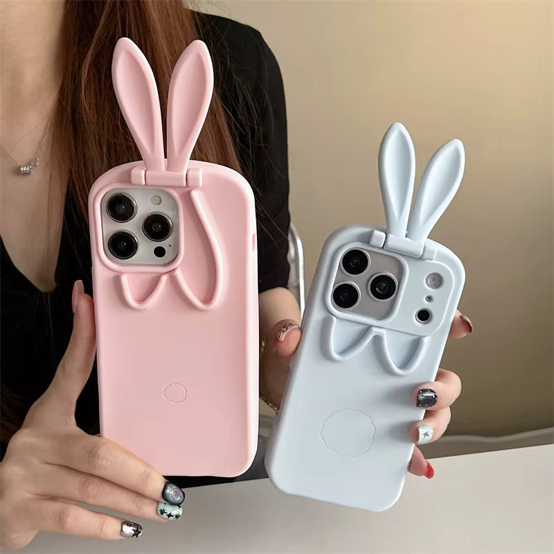 MUQGEW Silikon Handyhülle mit 3D-Cartoon-Hasenohren und faltbarem Ständer für iPhone 17, 16, 15, 14, 13 Pro Max in Pink - Bild 1