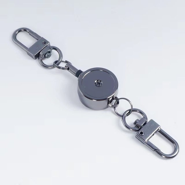 Einziehbarer Ausweis-Schlüsselhalter aus Metall mit elastischem Kabel in Bronze oder Silber - Bild 1
