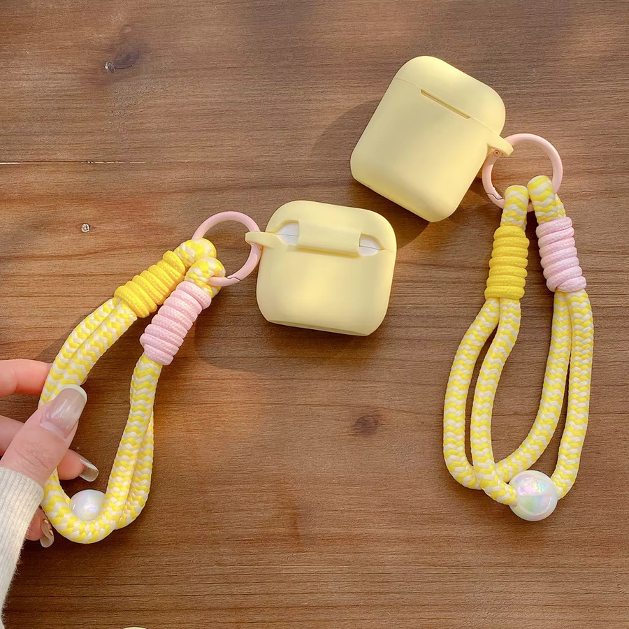 Milchgelbe Silikon-Softshell-Hülle mit matter Textur und Perlen-Lanyard für Apple AirPods 2 3 4 Pro Pro2 Pro3 in Beige - Bild 3