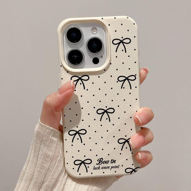 TUNEDEE Kirsch Handyhülle aus weichem Leder mit Herz und Schleife für iPhone 16 Pro Max, 15, 14, 13, 12 in Pink und Beige - Bild 1