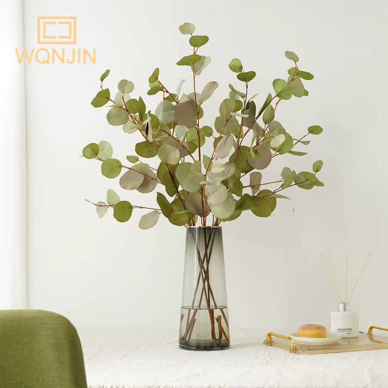 WQNJIN Künstlicher Eukalyptus-Apfelzweig in Grün zur Dekoration für Hochzeit und Zuhause - Bild 1