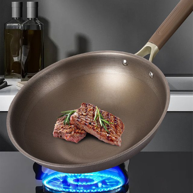 Unbeschichteter Wok aus Titan-Edelstahl für Induktions- und Gasherde - Bild 1