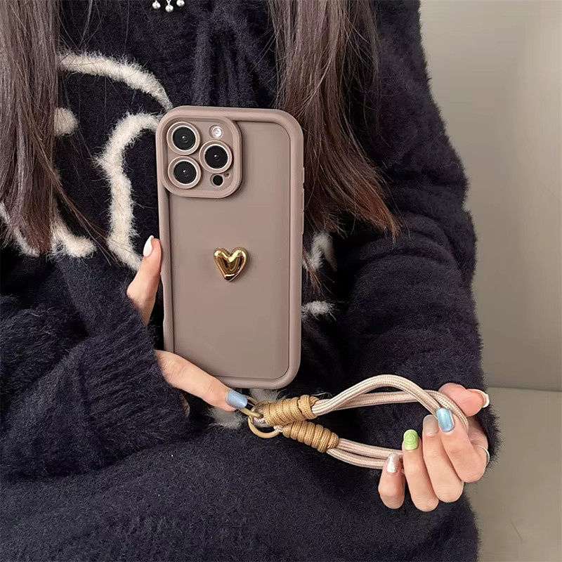 Goldene 3D Herzförmige Schutzhülle mit Handgelenkschlaufe für Apple iPhone Modelle in Beige und Gold - Bild 2
