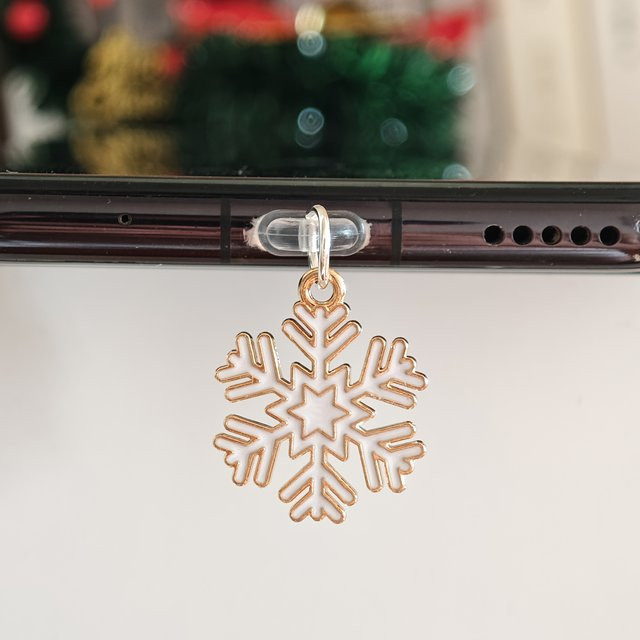 Weihnachts-Schneeflocken Staubschutzstecker für USB-C Ladeanschlüsse in Gold - Bild 1