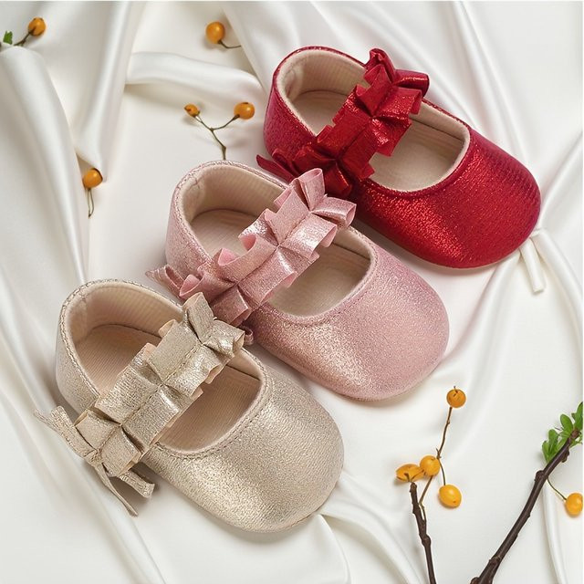 VALEN·SINA Babyschuhe für Mädchen mit Schleife und weicher Sohle in Gold - Bild 1