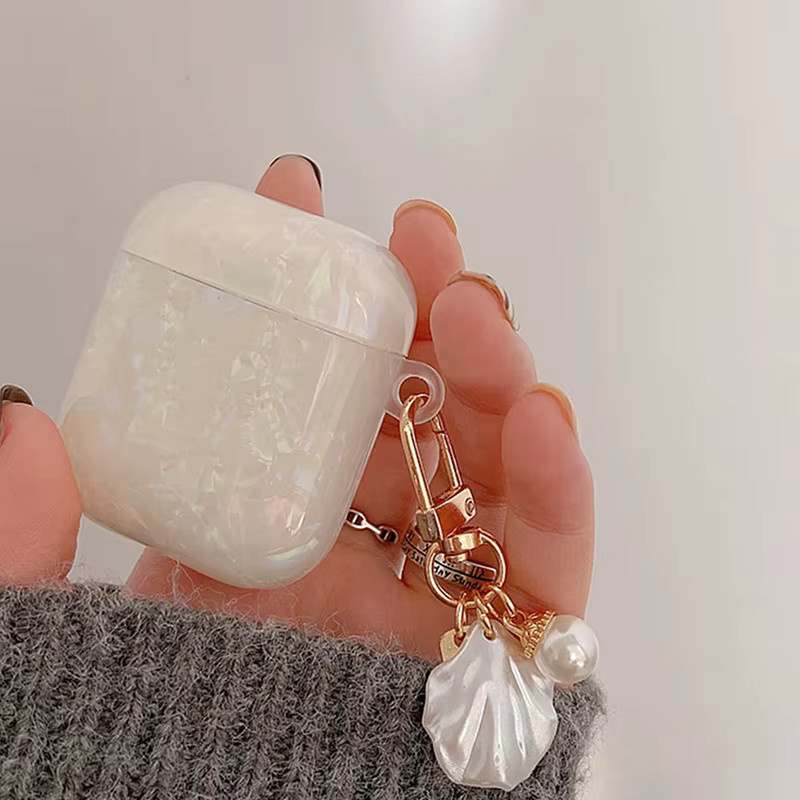 Dreamy Pearl Silikon Schutzhülle für Apple AirPods 4, 3, 2, 1 und AirPods Pro 1. & 2. Generation in Weiß und Rosa - Bild 2