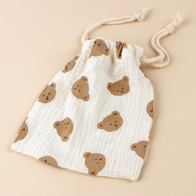 Multifunktionale Baby Windeltasche aus Baumwolle in Weiß mit Kordelzug zur staubfreien Lagerung von Kinderwagen-Zubehör - Bild 1