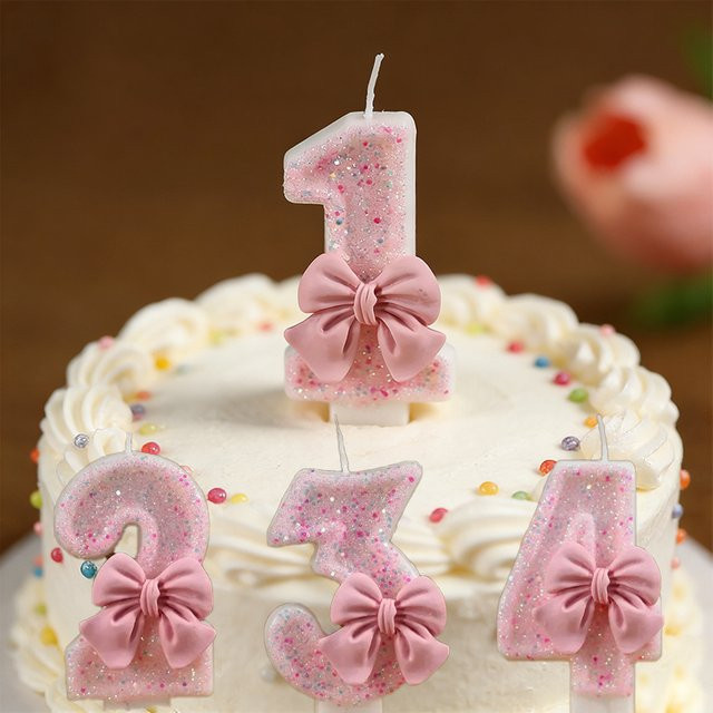 Potdemiel Kuchenkerzen in Form einer rosa Schleife mit Pailletten für deine Geburtstagsdekoration, Farbe: Pink - Bild 1