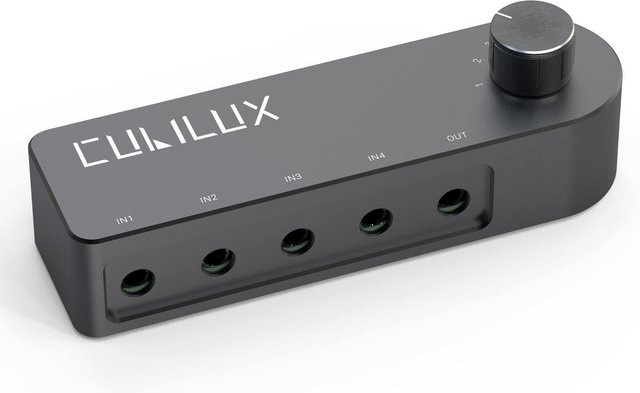 Cubilux Bidirektionaler Audio-Umschalt-Hub 4-Port-Selektor mit 4 Eingängen und 1 oder 4 Ausgängen, 3,5-mm-Klinken-Schalter, Schwarz - Bild 1