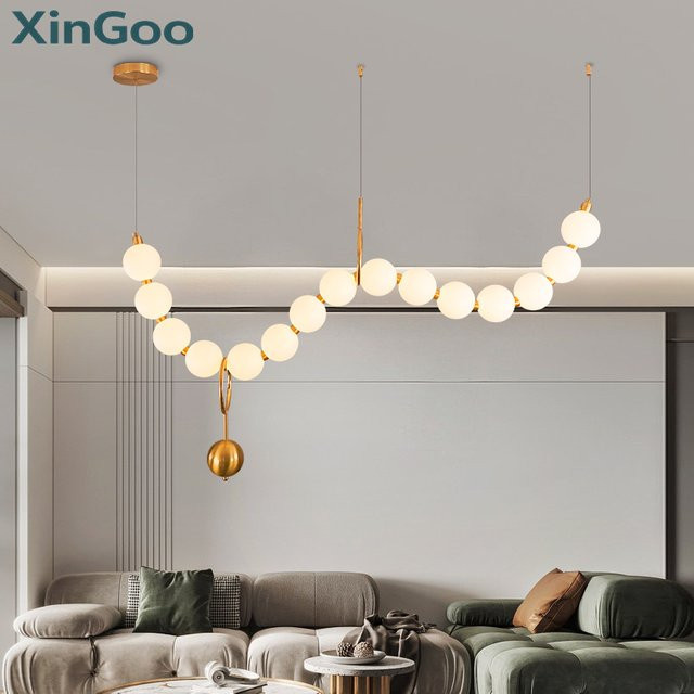 XINGOO Nordic LED-Pendelleuchte in Gold/Messing mit kugelförmigen Glaselementen für Esszimmer und Bartheken - Bild 1
